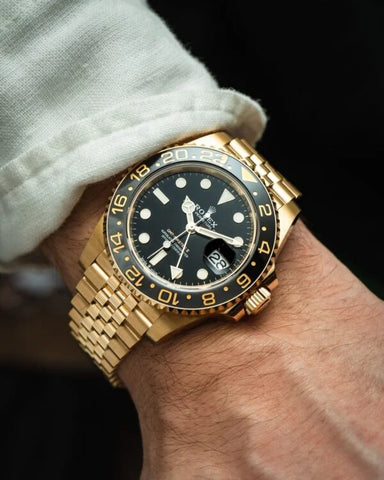 Rolex GMT-Master II – Yellow Gold, Black Dial, Jubilee Bracelet